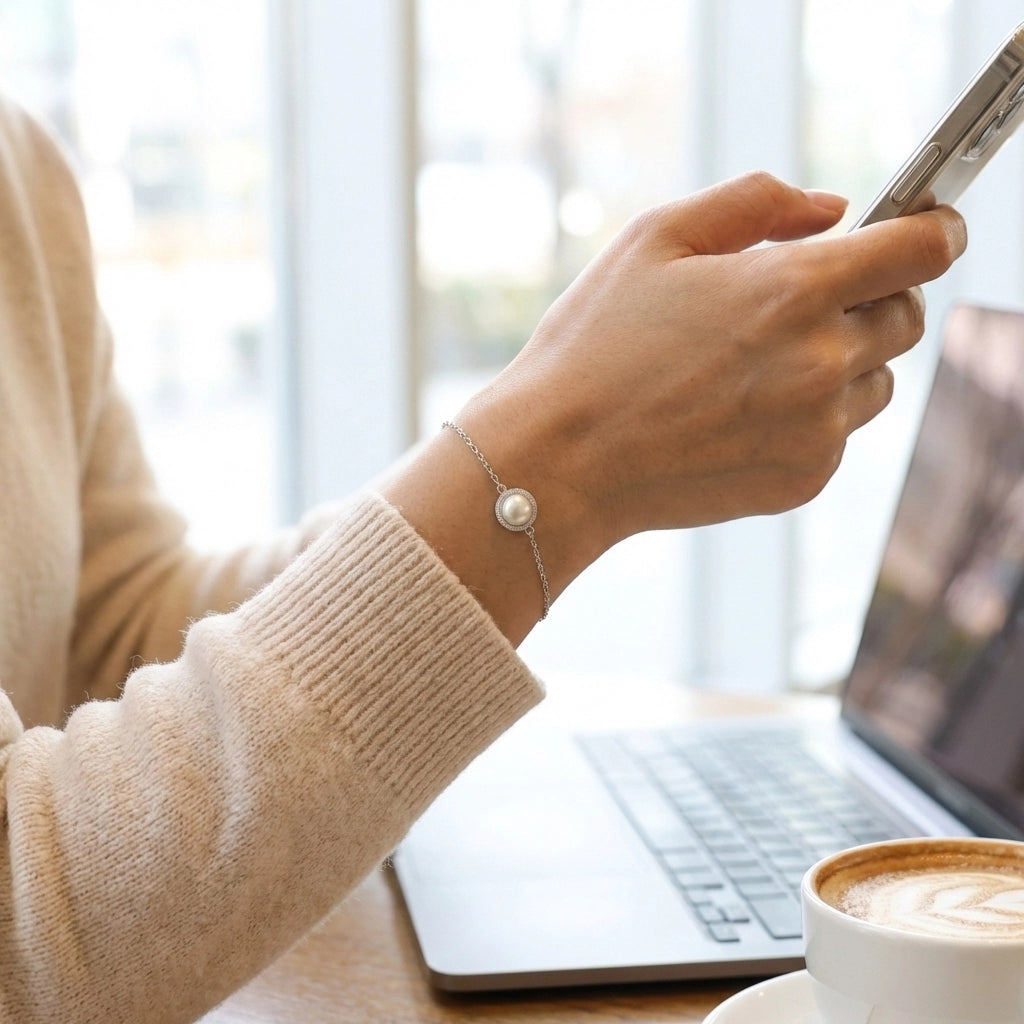 Elegant pearl and silver bracelet flat lay
