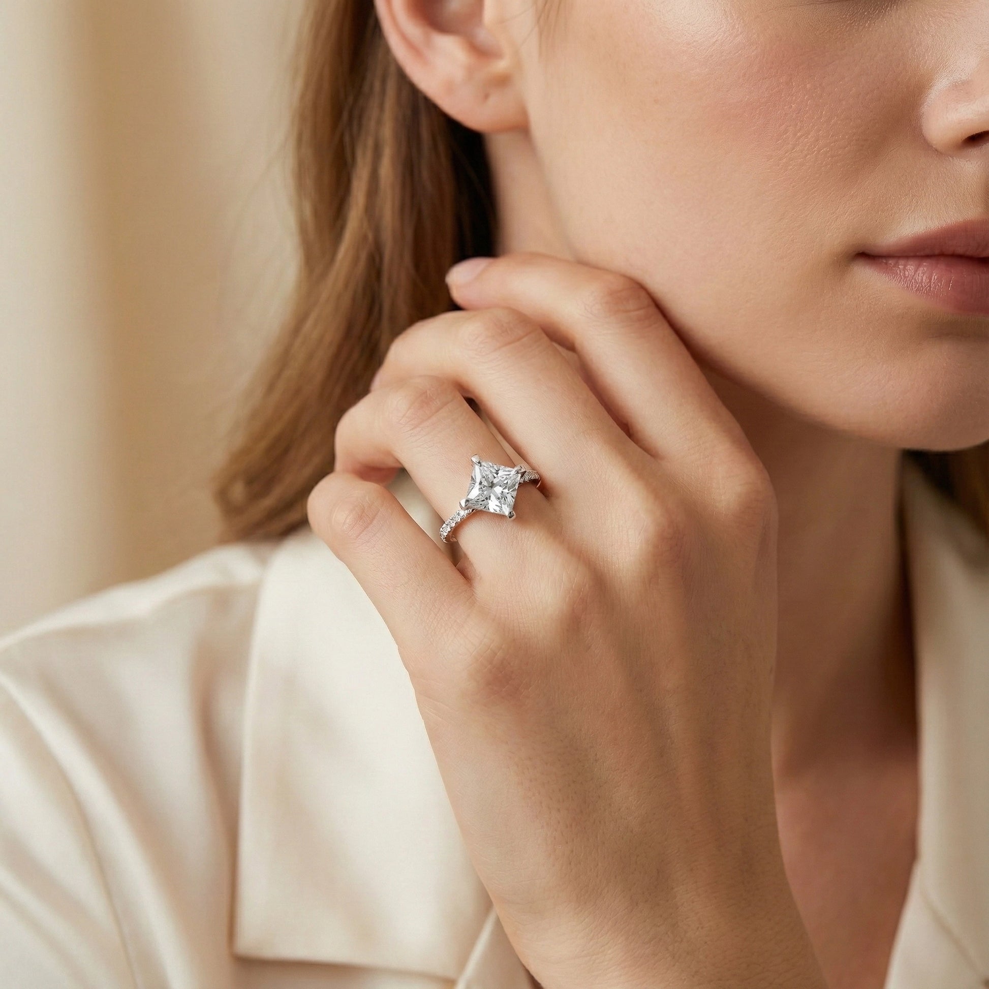 Diamond ring on a beige background