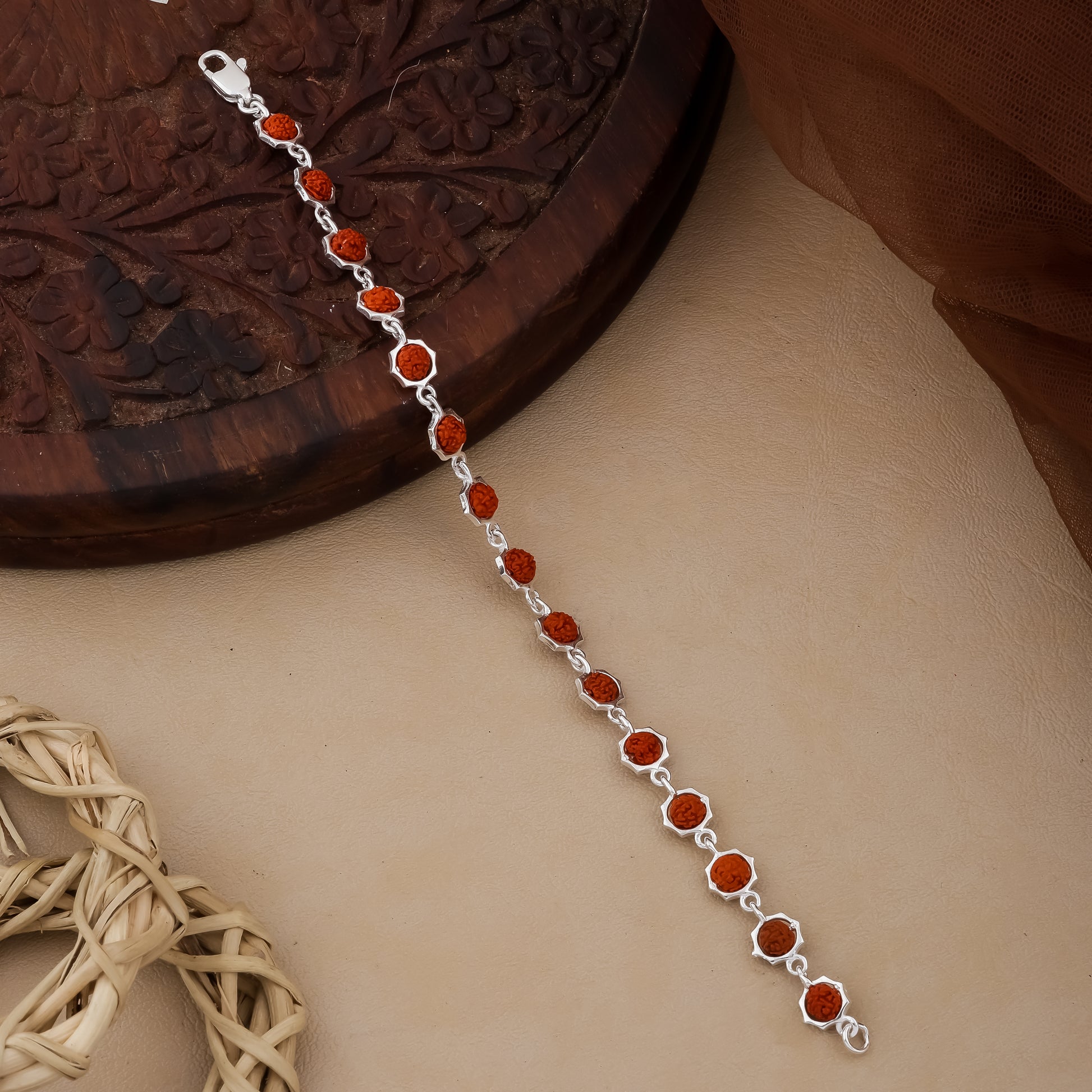 silver-covered Rudraksha beads that highlight the natural texture