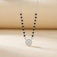 Black bead mangalsutra necklace with round diamond charm