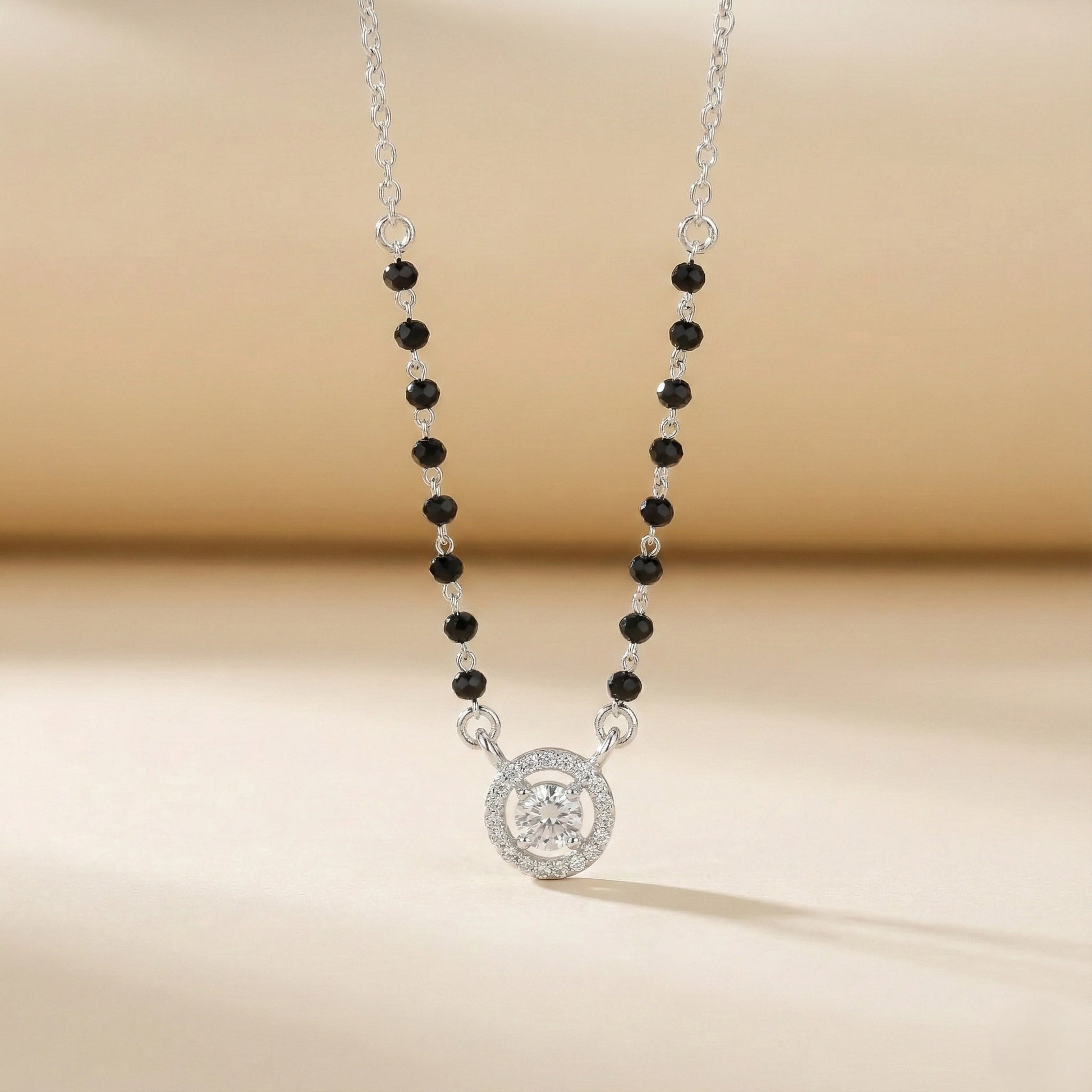 Black bead mangalsutra necklace with round diamond charm