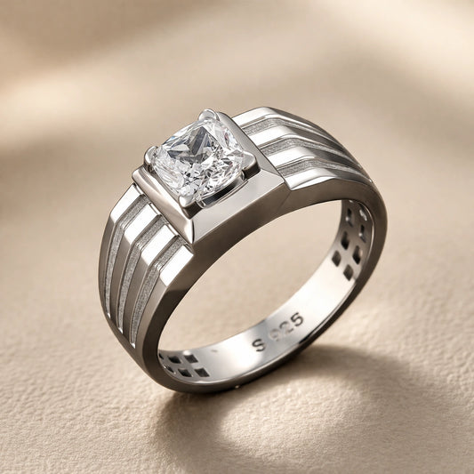 Silver ring with a diamond on a beige background