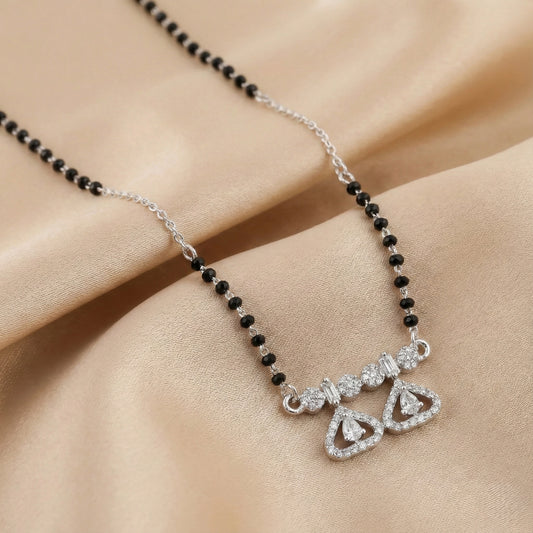 Silver mangalsutra with black beads and double heart diamond pendant