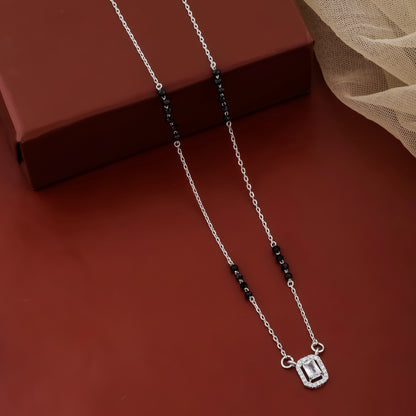 Contemporary mangalsutra with black beads and geometric halo pendant
