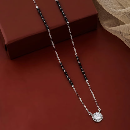 Necklace with a pendant on a brown surface