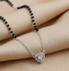 Modern silver mangalsutra featuring black beads and heart pendant