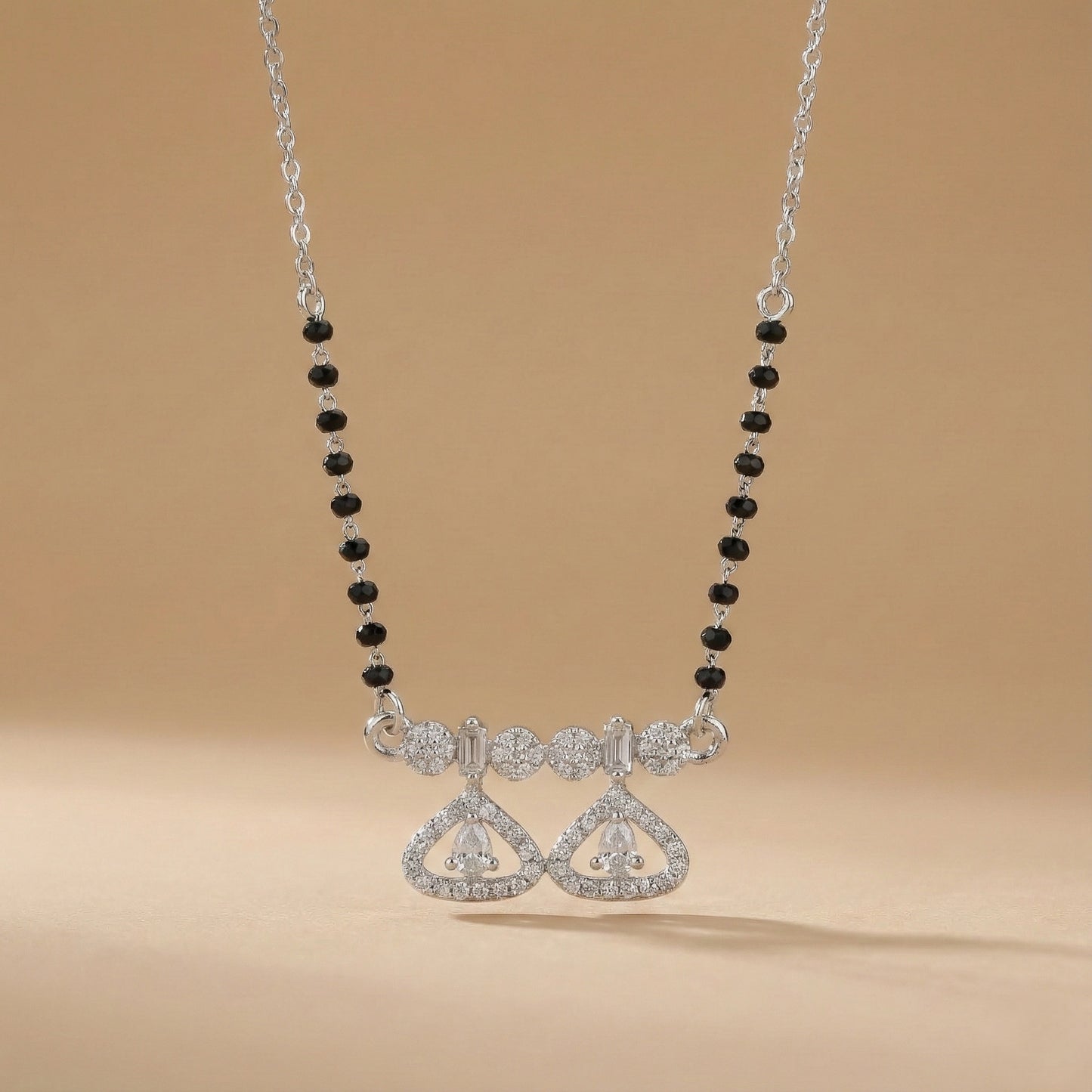 Minimal mangalsutra with silver chain and dual heart pendant