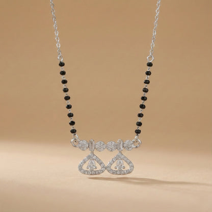 Minimal mangalsutra with silver chain and dual heart pendant