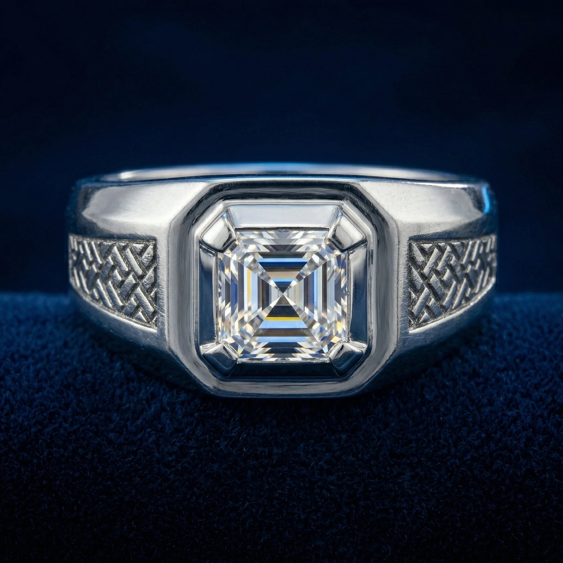 Silver ring with a large diamond on a dark blue background