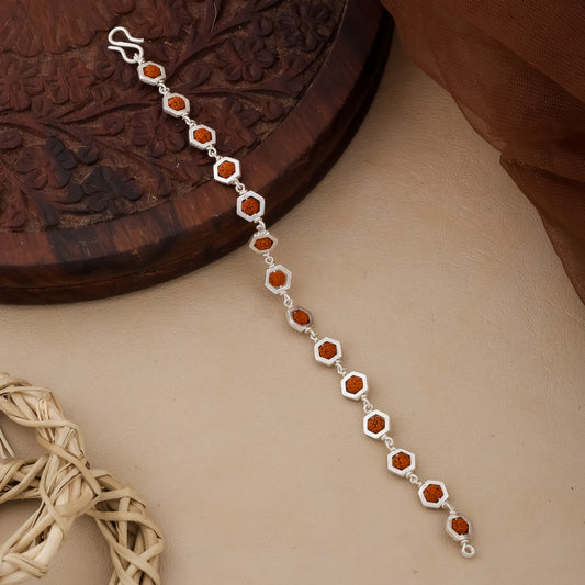 Man wearing 925 silver hexagon Rudraksha spiritual bracelet with S-lock