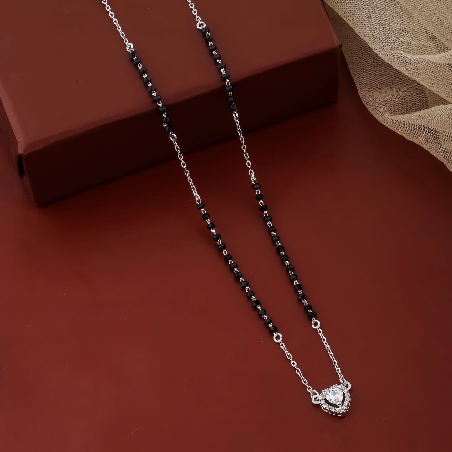 Minimalist mangalsutra with silver chain and heart design pendant
