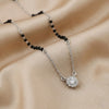 Silver mangalsutra with black beads and floral diamond cluster pendant