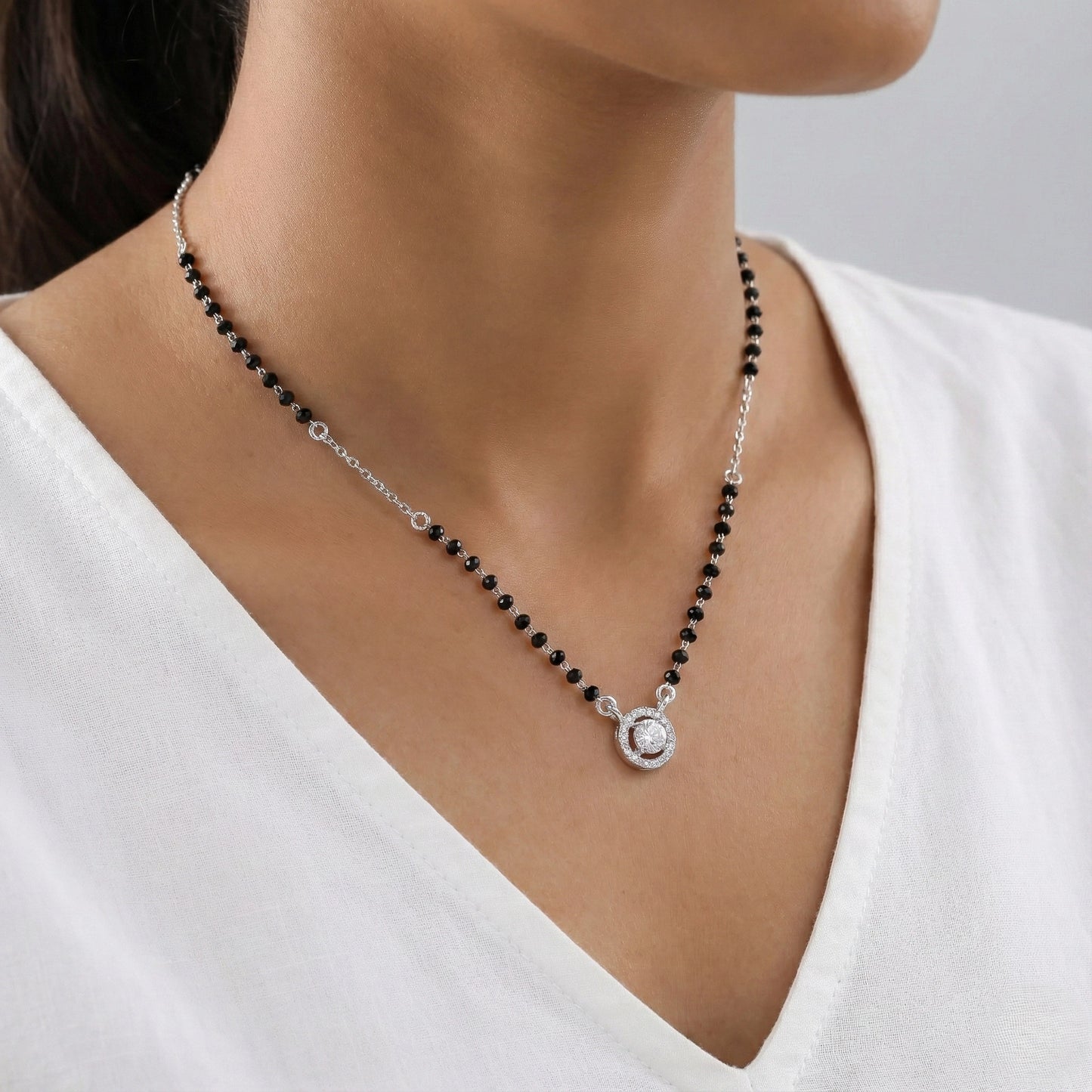 Minimal mangalsutra with silver chain and round stone pendant
