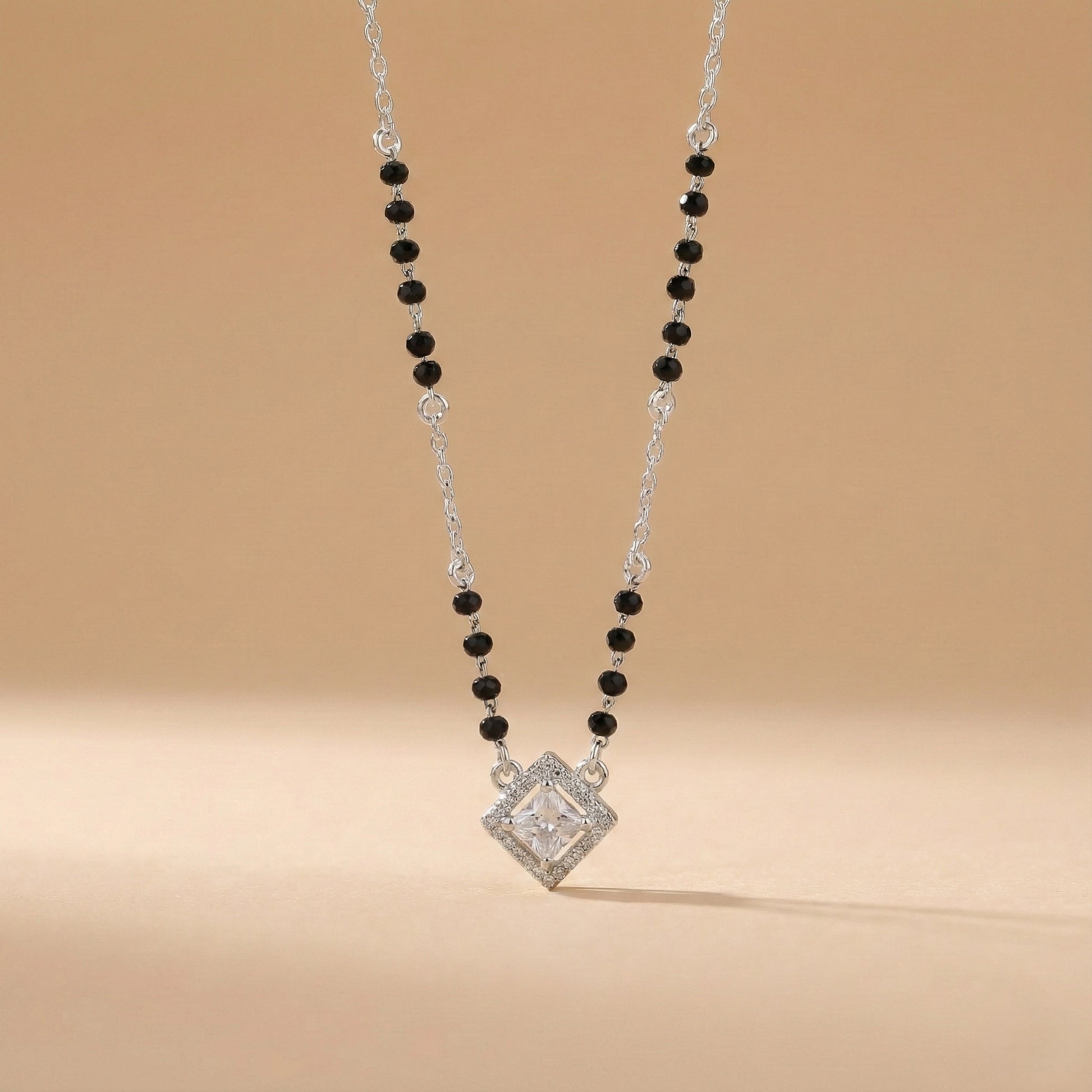 Minimal mangalsutra with silver chain and square stone pendant