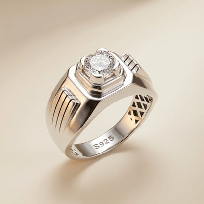 Silver ring with a diamond on a beige background
