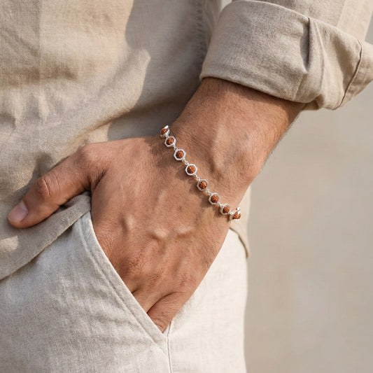 Person wearing a bracelet on a blurred background