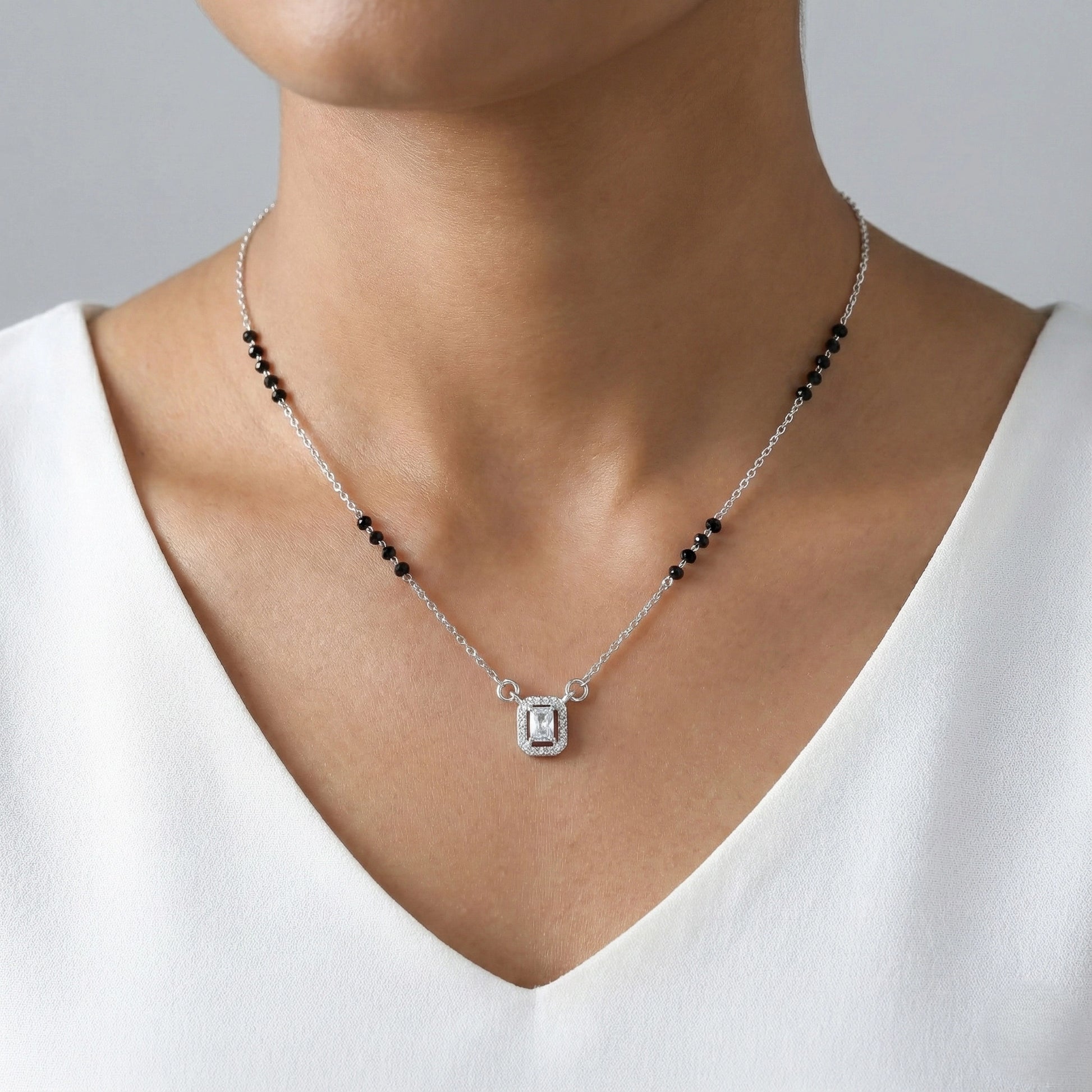 Minimal mangalsutra with silver chain and rectangular stone pendant