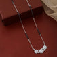 Elegant silver mangalsutra with black beads and triple diamond design