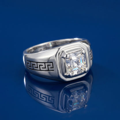 Silver ring with a large diamond on a blue background