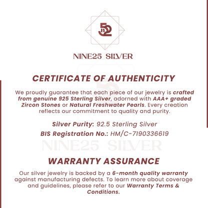 Certified 925 sterling silver charm bracelet with heart, star and bell charms on maroon cloth — certificate included