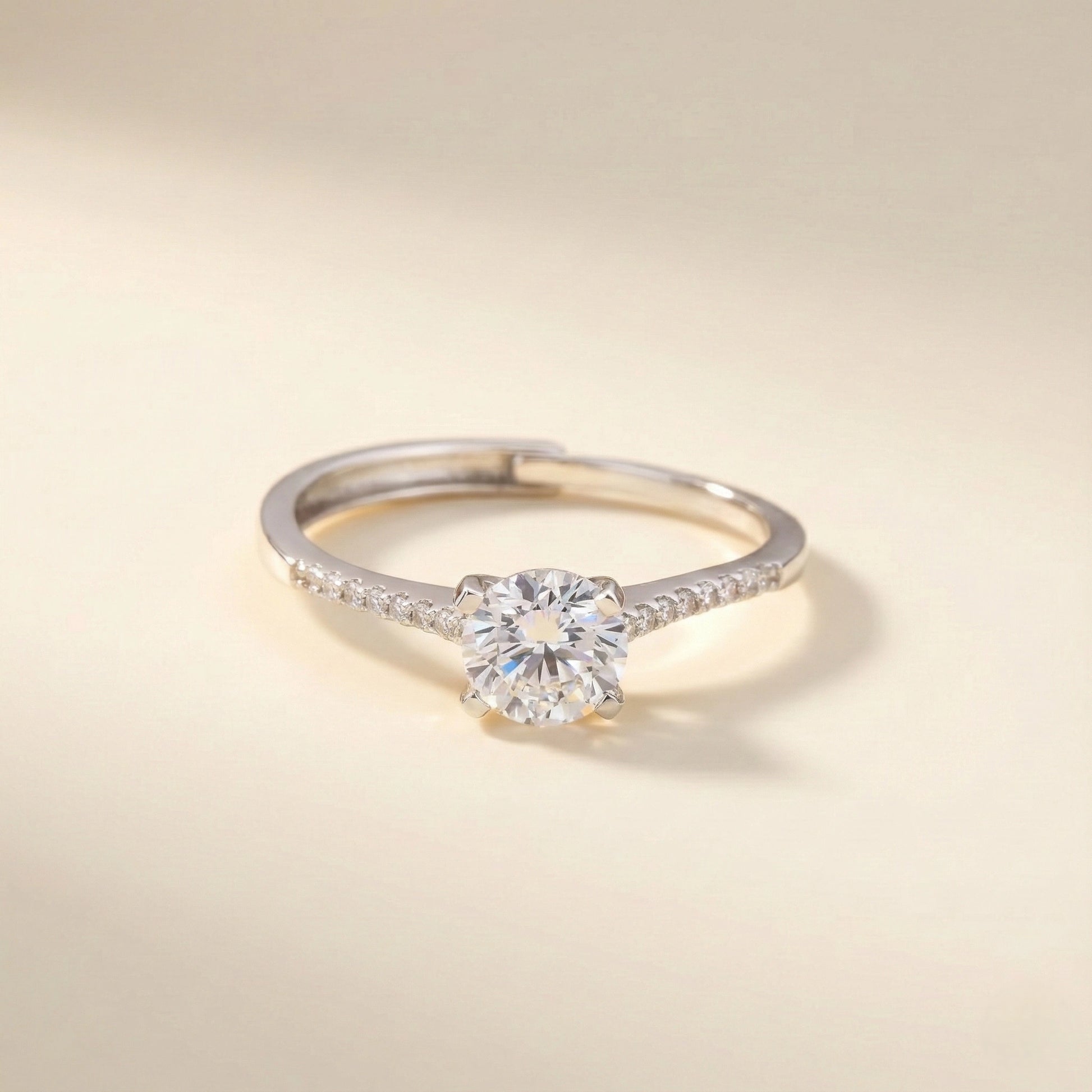 Diamond ring on a light beige background