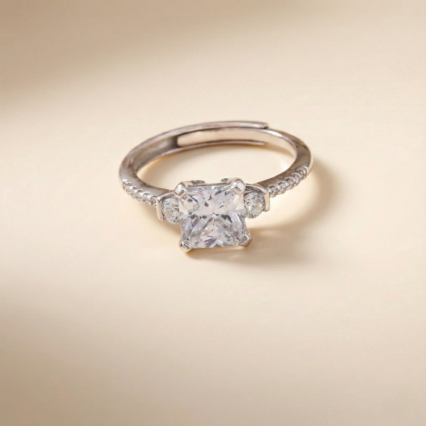 Diamond ring on a beige background