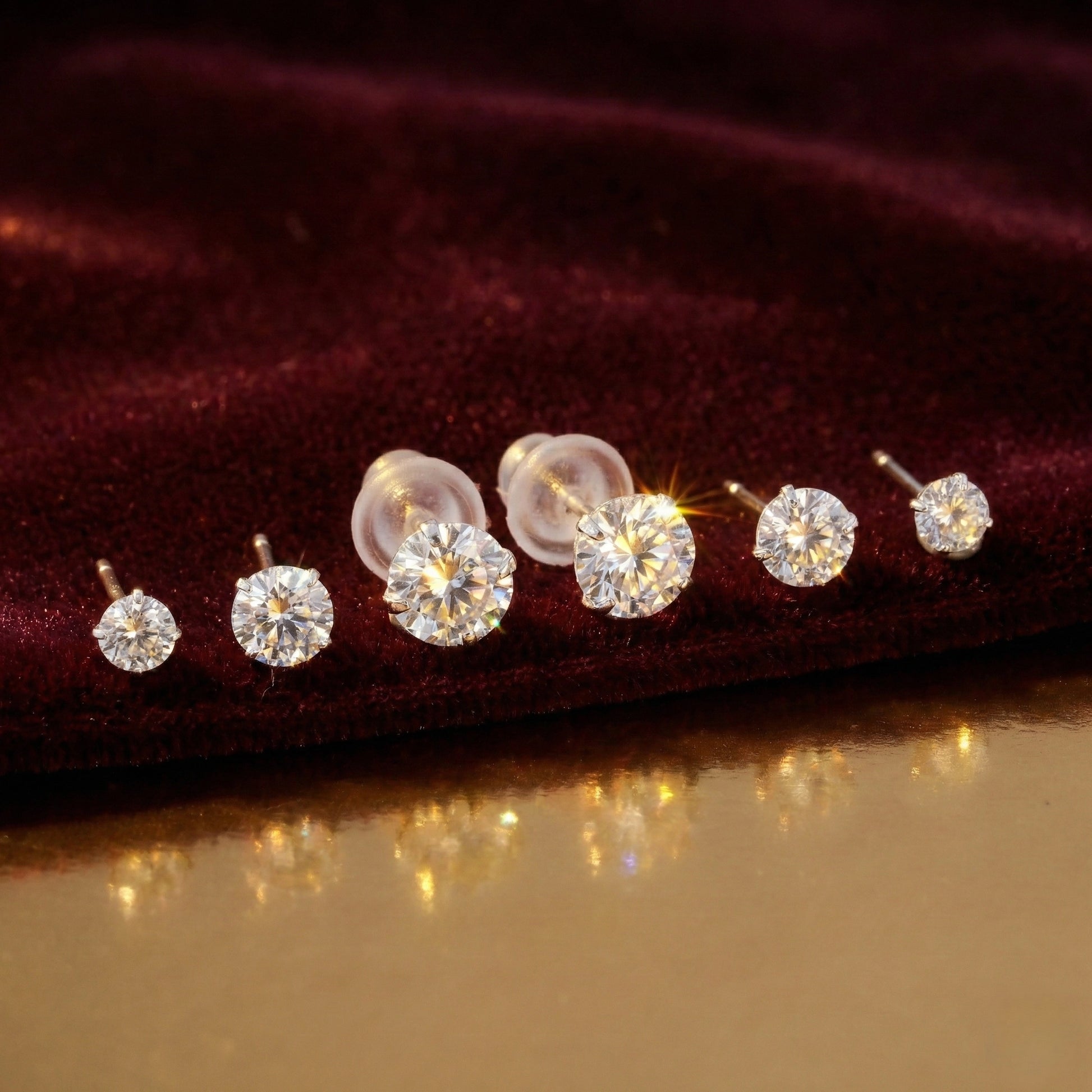 Classic round-cut cubic zirconia stud earrings with push-back closures