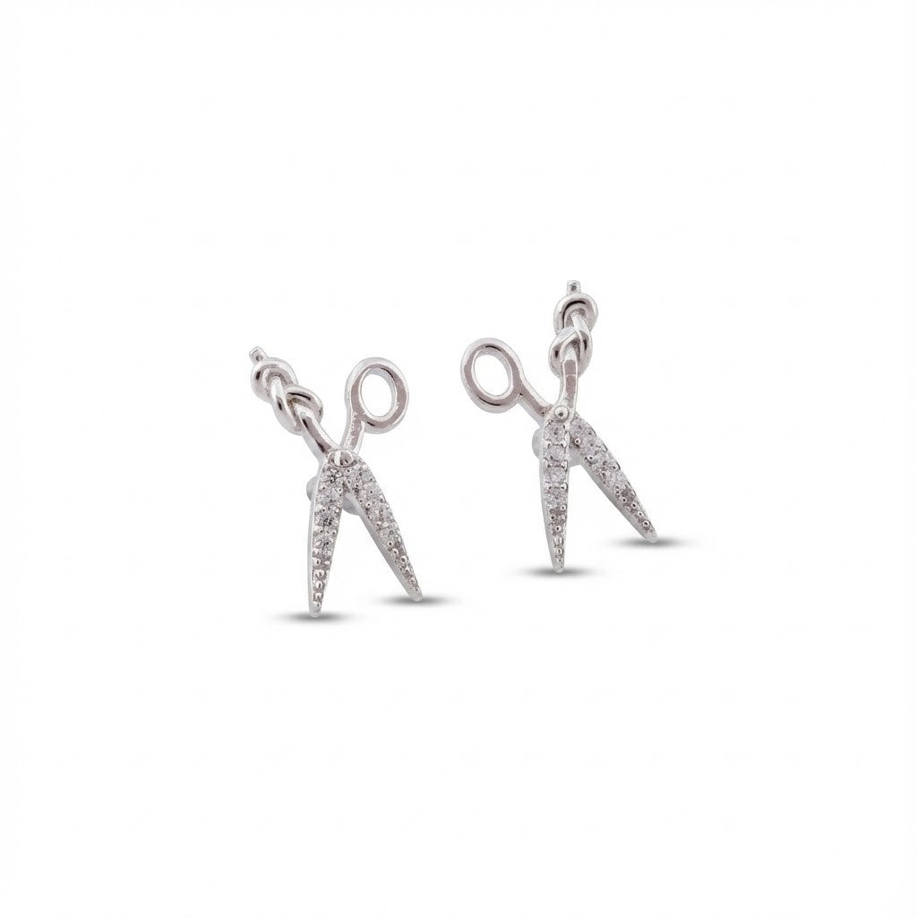 Silver scissors-shaped earrings on a white background