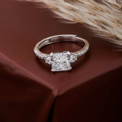 Diamond ring on a brown fabric background