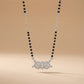 Elegant silver mangalsutra with traditional black beads and sparkling twin circular pendant
