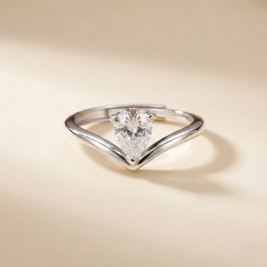 Diamond ring with a unique triangular band on a beige background