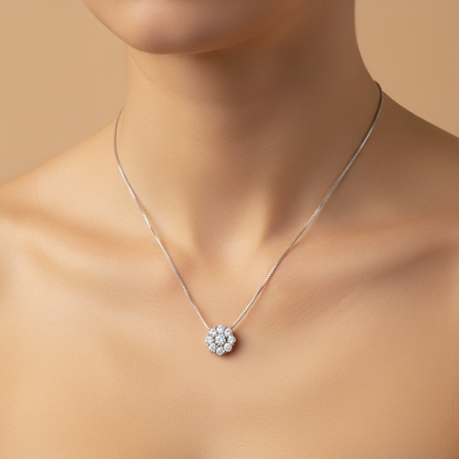 Silver necklace with a floral pendant on a mannequin against a beige background
