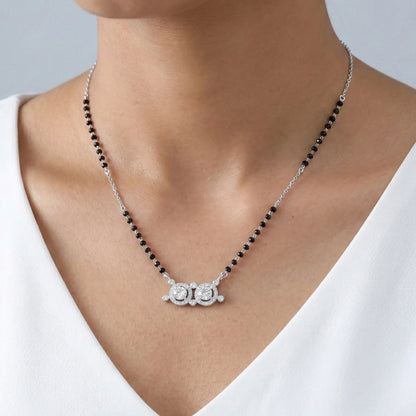 925 sterling silver mangalsutra featuring black beads and a double round diamond-style pendant
