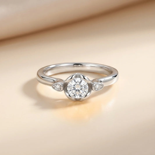 Silver ring with a diamond on a beige background