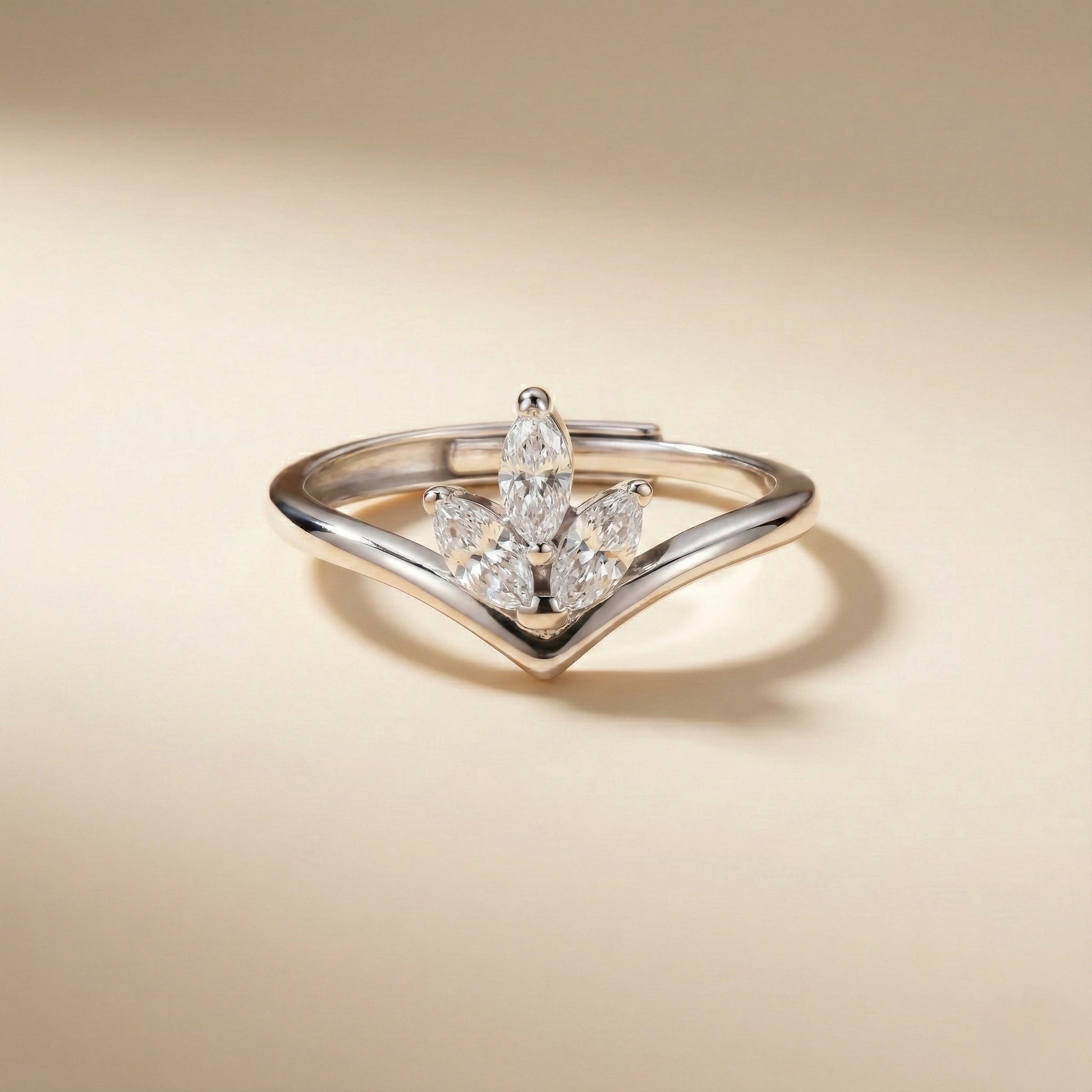 Diamond ring with a unique design on a beige background