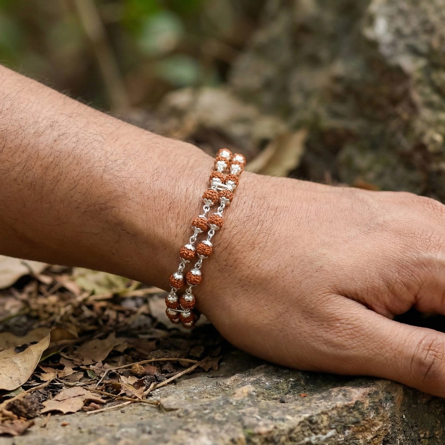 Bracelet on a wrist with a natural background