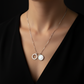 Necklace with a pendant on a black background