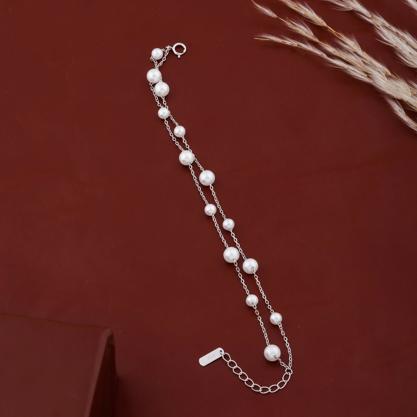 Dainty pearl chain bracelet with extension chain detail