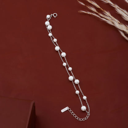 Dainty pearl chain bracelet with extension chain detail