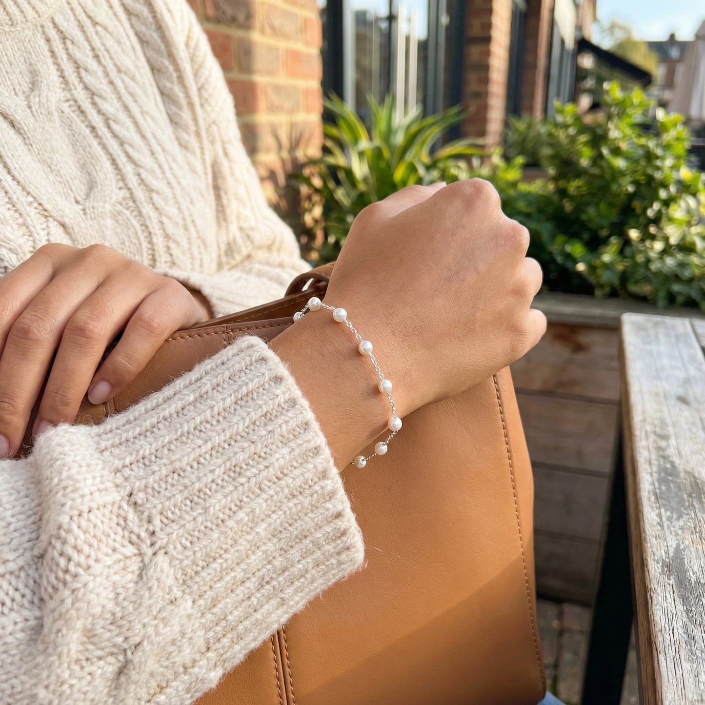 Elegant pearl and silver bracelet product photography